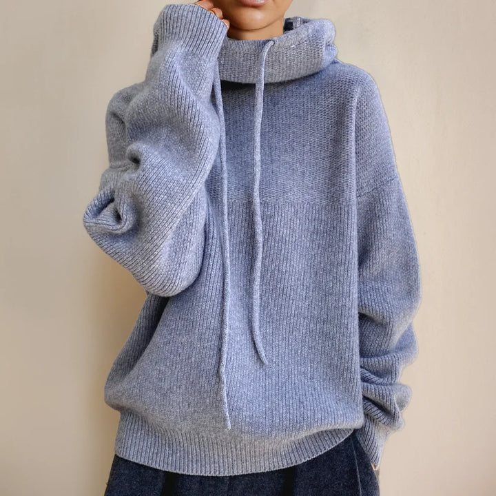 Grau Damen Pullover mit Rollkragen und Kordeldetails, aus weicheren Materialien, ideal für lässige und stilvolle Outfits.