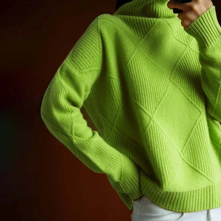 Damen Pullover mit Rollkragen, gestrickt aus weicher Wolle, mit einzigartigem Muster in sanften Farbtönen. Ideal für kühlere…