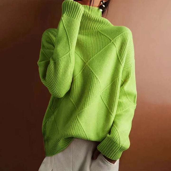 Damen Pullover mit Rollkragen aus weicher Wolle und feinem Strickmuster in klassischen Farben für einen zeitlosen Look.