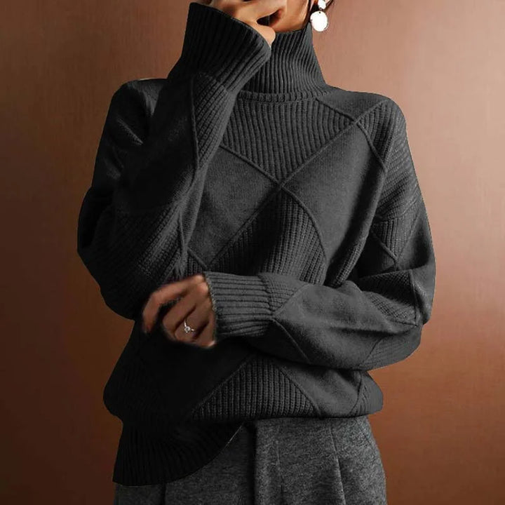 Damen Pullover in Schwarz mit Rollkragen, feinem Strickmuster und angenehmem, weichen Material für Komfort und Stil.