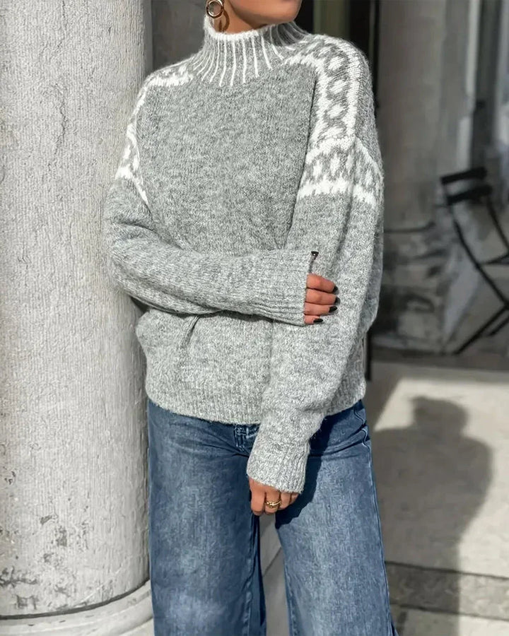 Damen Pullover aus weichem Strick, mit einzigartigem Muster und hohem Kragen für besonderen Komfort und Wärme.