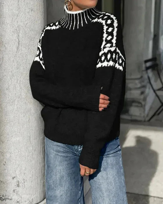 Damen Pullover aus weichem Strick mit hohem Kragen und strukturiertem Muster in sanften Farben. Ideal für kalte Tage.