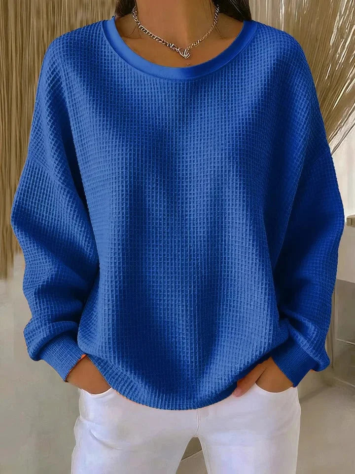 Damen Pullover in Blau mit strukturiertem Design, Rundhalsausschnitt und weichem, atmungsaktivem Material.