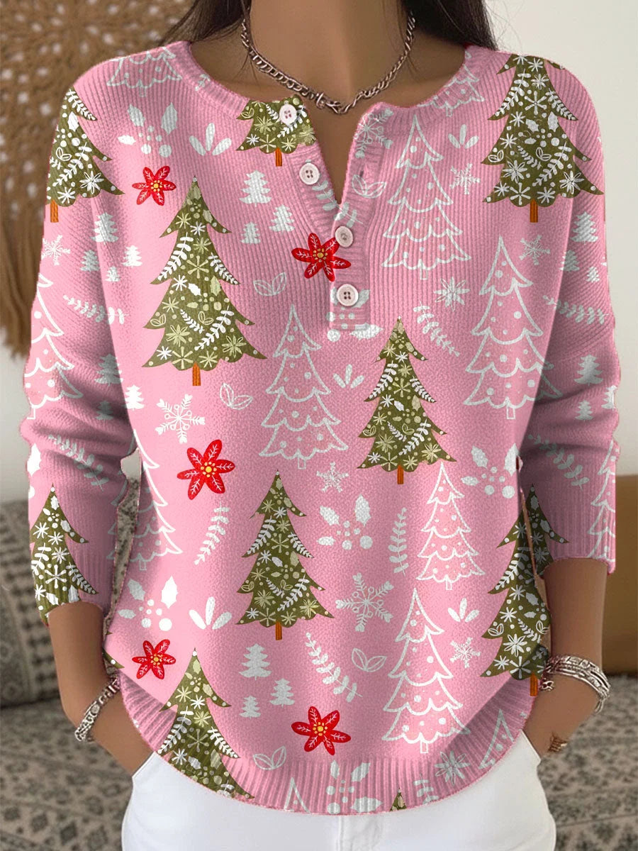 Rosa Damen Pullover mit weihnachtlichem Muster, Knopfleiste und weichem Strickmaterial für einen gemütlichen Look.