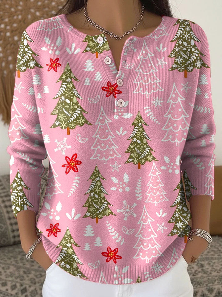 Rosa Damen Pullover mit weihnachtlichem Muster, Knopfleiste und weichem Strickmaterial für einen gemütlichen Look.