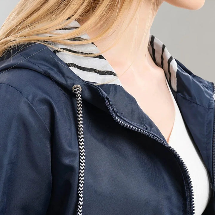 Damen Regenjacke mit gestreiftem Innenfutter und Reißverschluss