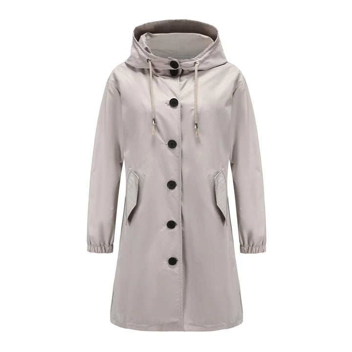 Damen Regenjacke aus wasserdichtem Material, mit Kapuze und Knopfleiste für zusätzlichen Schutz und stimmigen Stil.