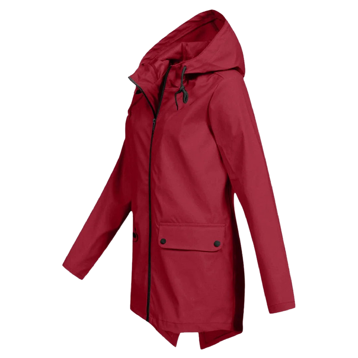 Damen Regenjacke mit Kapuze aus wasserdichtem Material, ausgestattet mit praktischen Taschen und modischem Schnitt.