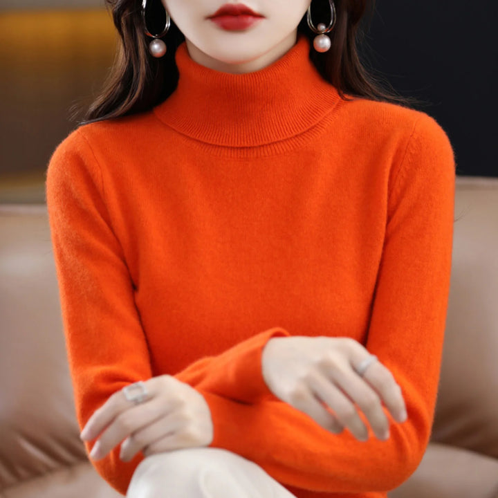 Orange Damen Rollkragenpullover aus weicher Wolle, ideal für den Winter, mit lässigem Schnitt und hohem Kragen für Wärme.