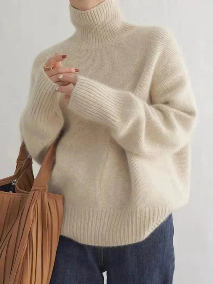 Oversize Damen Rollkragenpullover mit überschnittenen Schultern