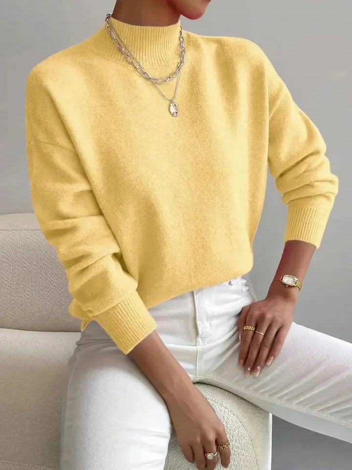Damen Rollkragenpullover in Gelb, aus weicher Baumwolle, mit gemütlichem Schnitt und langem Arm für kuschelige Wärme.