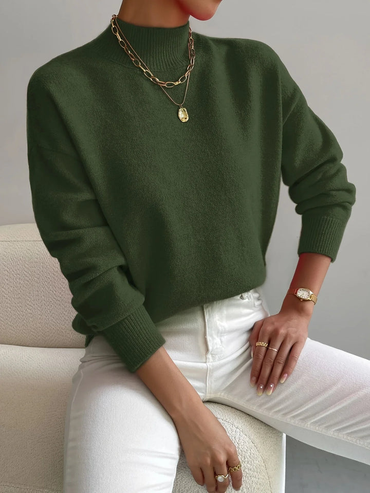 Grüner Damen Rollkragenpullover aus weichem Material mit entspannter Passform und langen Ärmeln für Komfort und Wärme.