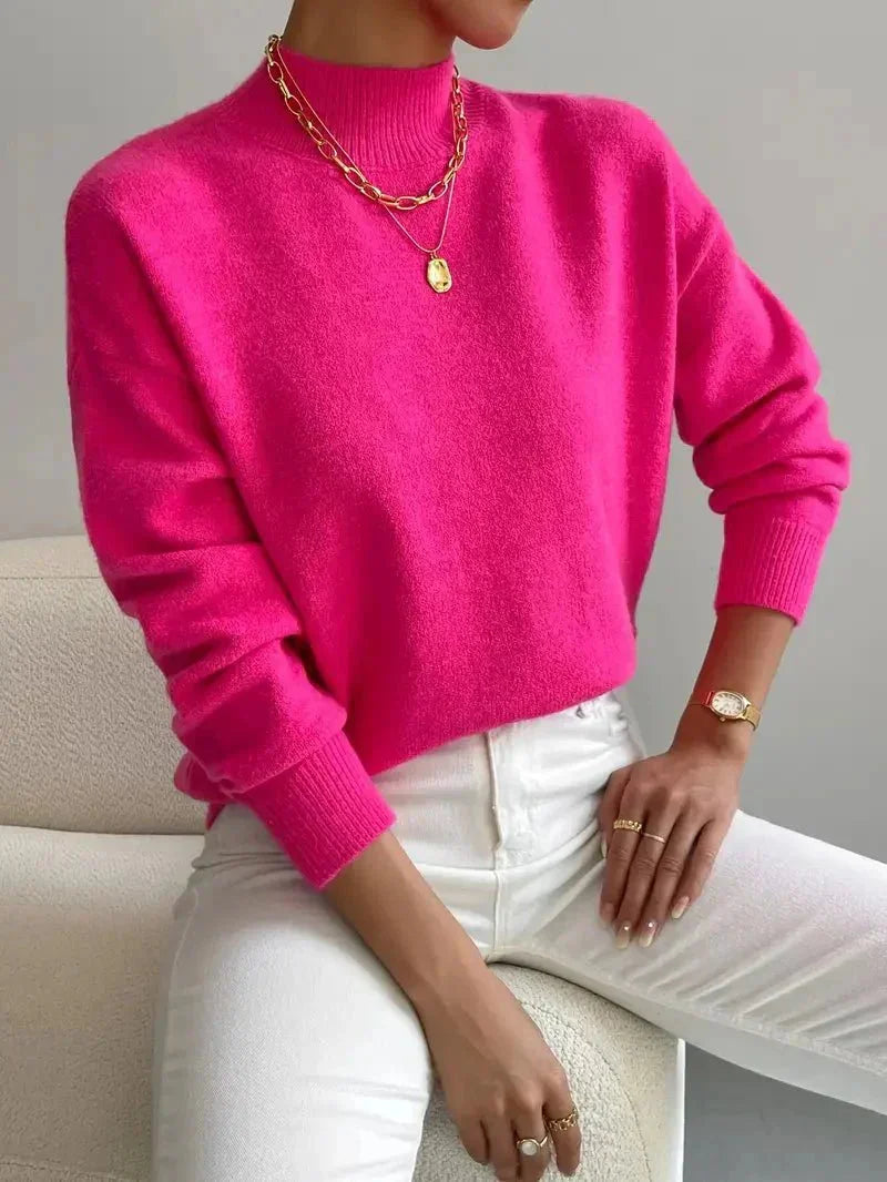 Damen Rollkragenpullover in Rosa aus weicher Baumwolle, gemütlicher Schnitt mit längerem Rückenteil für extra Komfort.