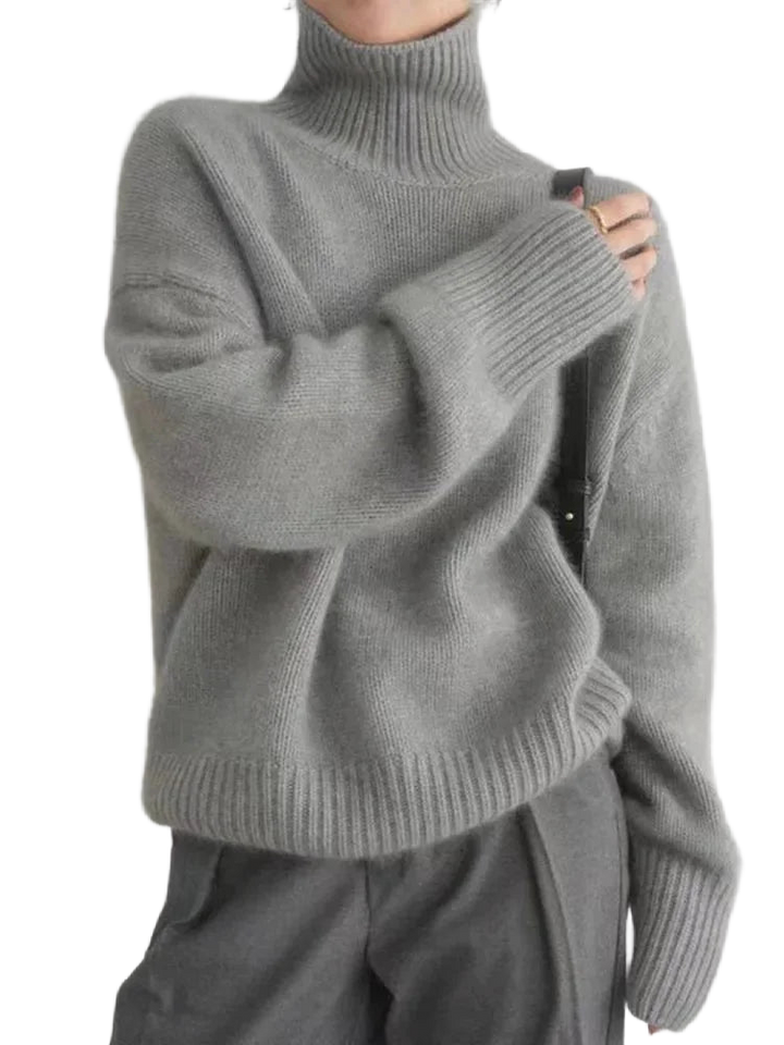 Grauer Damen Rollkragenpullover aus weichem Material mit klassischem Design und bequemem Schnitt für den Alltag.