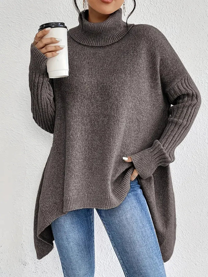 Damen Rollkragenpullover in Espressobraun, aus weichem Strick, lange Ärmel und lockere Passform für bequemen Tragekomfort.