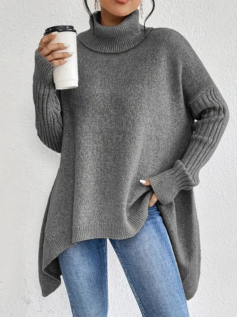 Damen Rollkragenpullover in Steingrau, aus weichem Material, mit langen Ärmeln und lockerer Passform für bequemen…