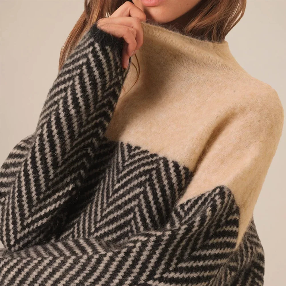 Damen Rollkragenpullover aus weicher Baumwolle, mit strukturiertem Strickmuster und langen Ärmeln in sanften Farben.