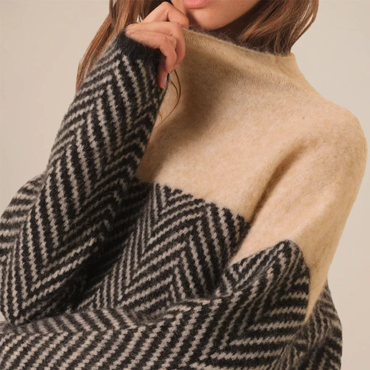 Damen Rollkragenpullover aus weicher Baumwolle, mit strukturiertem Strickmuster und langen Ärmeln in sanften Farben.