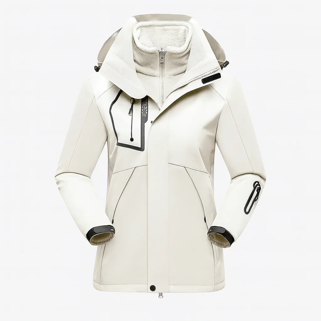 Weiße Damen Skijacke mit Fleece-Innenfutter, abnehmbarer Kapuze und funktionellen Taschen für maximalen Komfort beim…