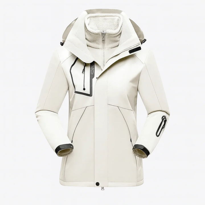 Weiße Damen Skijacke mit Fleece-Innenfutter, abnehmbarer Kapuze und funktionellen Taschen für maximalen Komfort beim…