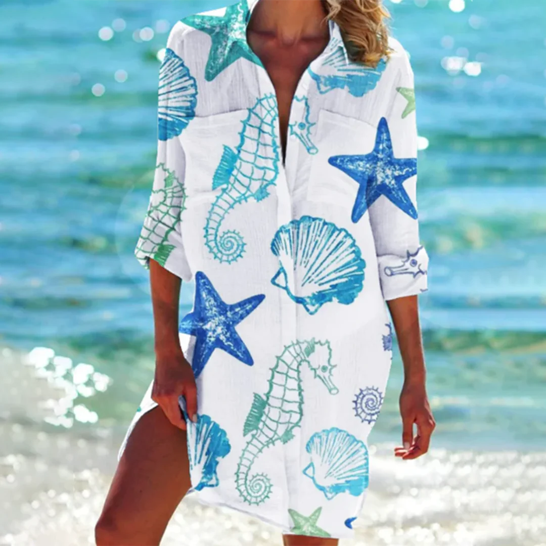 Blau gestreiftes Damen Sommer-Shirt in Batik-Optik mit Knopfleiste und Seesternmuster.