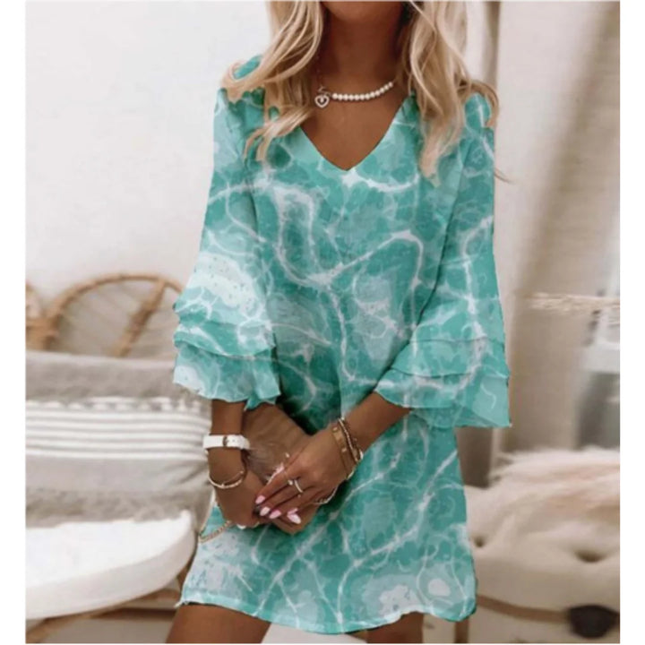 Blau Damen Sommerkleid mit Trompetenärmeln aus leichtem Stoff, ideal für warme Tage. Elegant geschnitten mit modischem…