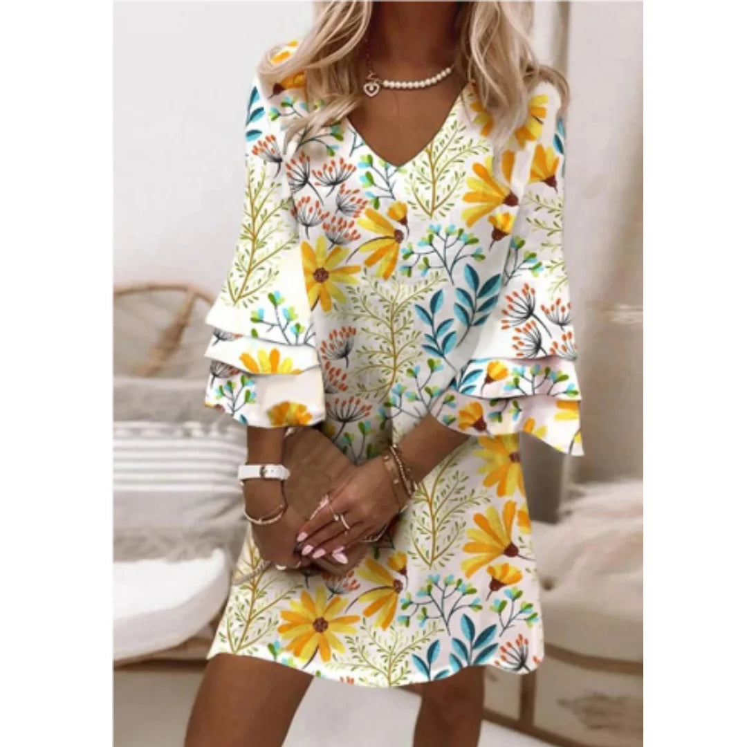 Gelbes Damen Sommerkleid mit Trompetenärmeln aus leichtem Stoff für den Sommer.