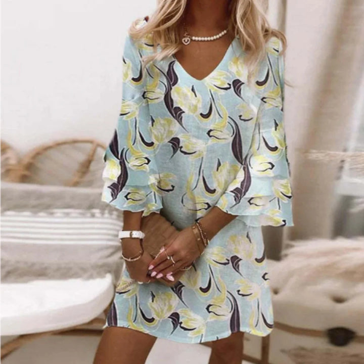 Grünes Damen Sommerkleid mit Trompetenärmeln, aus leichtem Stoff, betont Taille, perfekt für den Sommer.