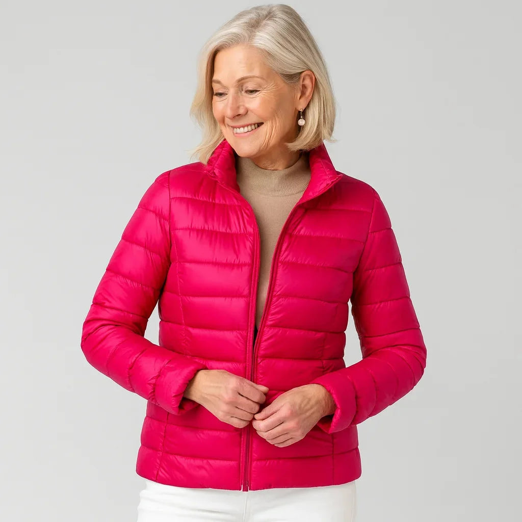 Damen Steppjacke aus warmem, gefüttertem Material, ideal für kalte Tage, mit Kapuze und praktischen Seitentaschen.