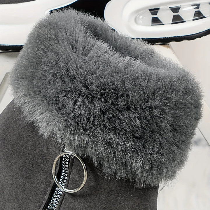 Damen Stiefeletten aus Leder mit seitlichem Reißverschluss und warmem Plüschfutter für komfortable Trageweise.