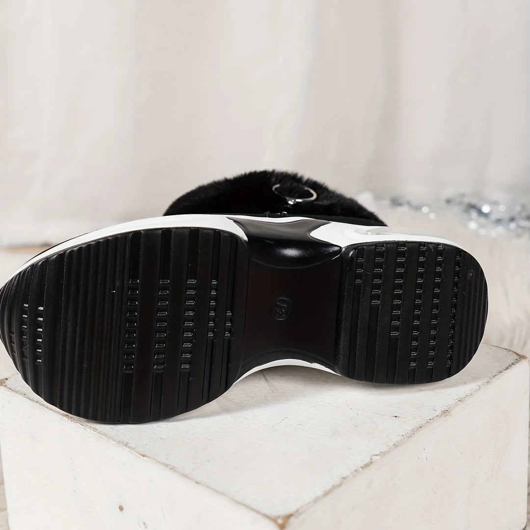 Damen Stiefeletten aus weichem Leder, mit seitlichem Reißverschluss und warmem Plüschfutter für zusätzlichen Komfort.