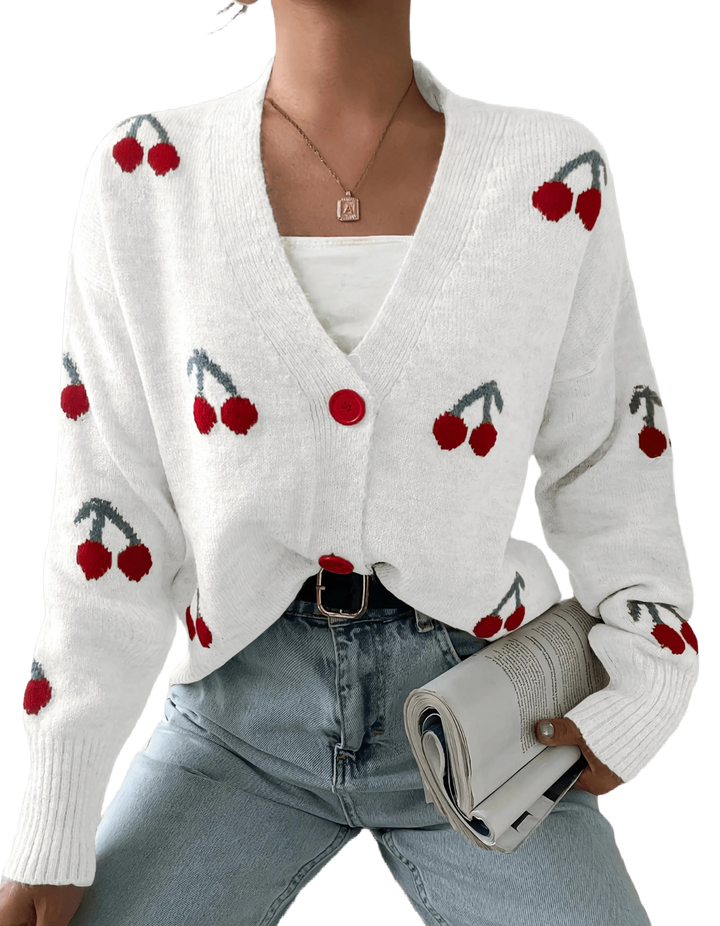 Damen Strickjacke in Weiß mit Knopfleiste, langen Ärmeln und weichem Material für bequemen Tragekomfort.