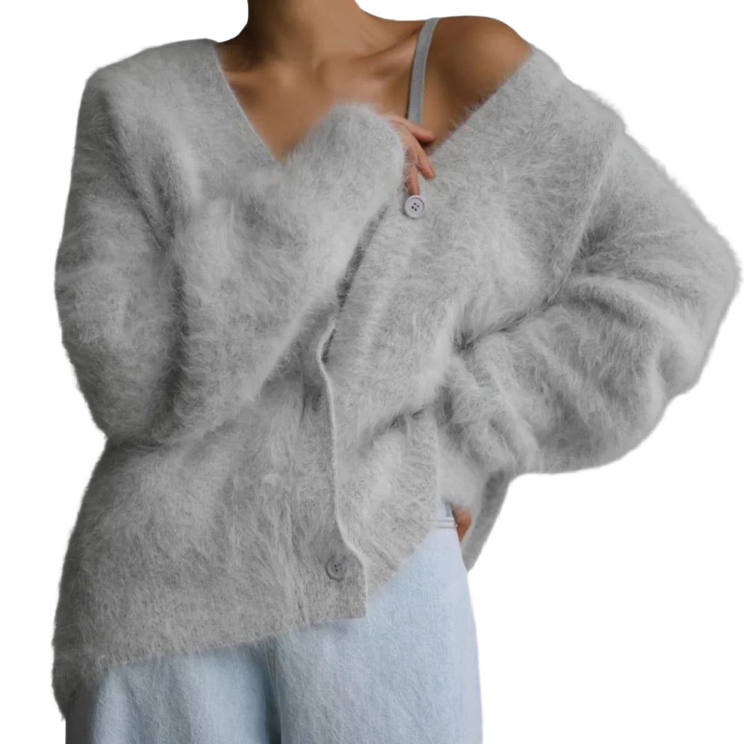 Hellgraue Damen Strickjacke mit Knopfleiste, überschnittenen Schultern und weichem, atmungsaktivem Strickmaterial.