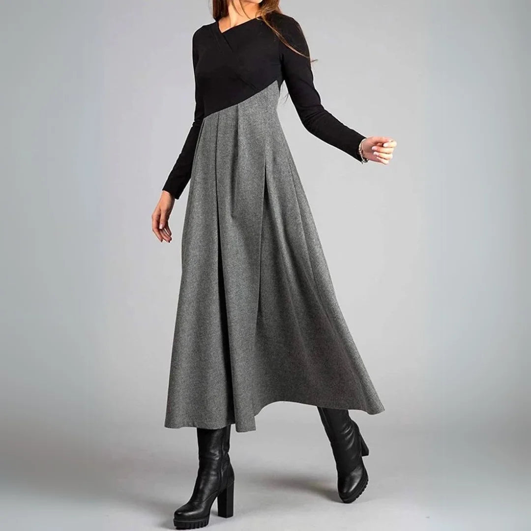 Damen Strickkleid in Schwarz und Grau, langarm, aus weichem Material mit klassischem, zeitlosem Design.