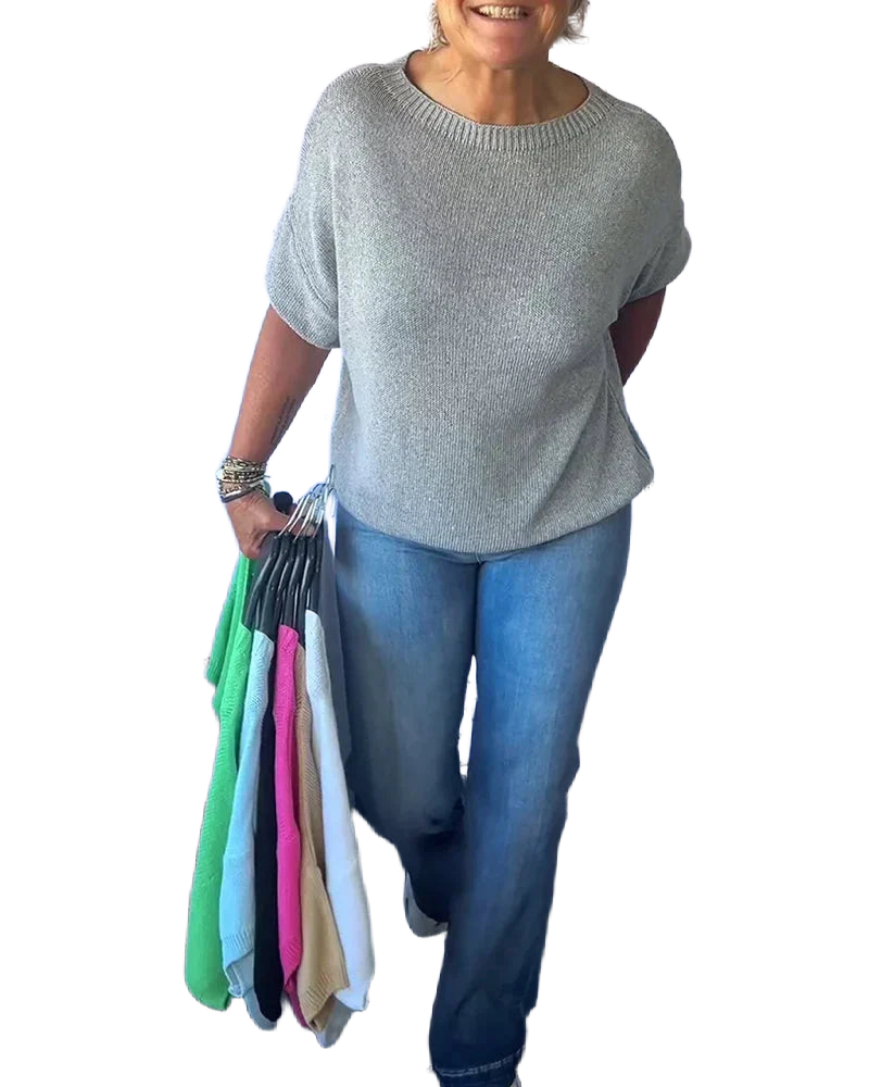 Grau Damen Strickpullover mit lockerer Passform, Rundhalsdesign und weichem, warmem Material für gemütliche Tage.