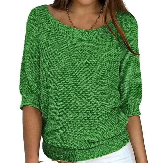 Grüner Damen Strickpullover mit halblangen Ärmeln, weichem Material und klassischem Rippmuster für komfortable Passform.