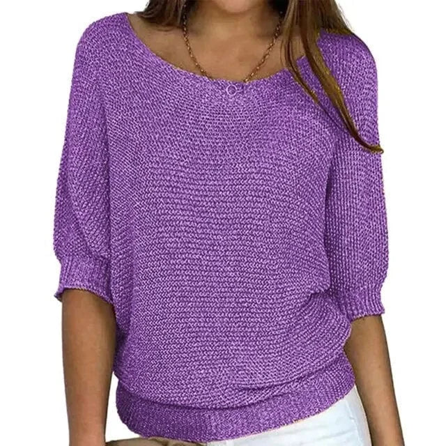 Lila Damen Strickpullover mit halblangen Ärmeln, aus weicher Baumwolle, mit lässigem Schnitt und feinem Muster.