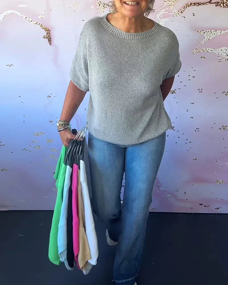 Grau Damen Strickpullover mit lockerer Passform, Rundhalsdesign und weichem, warmem Material für gemütliche Tage.
