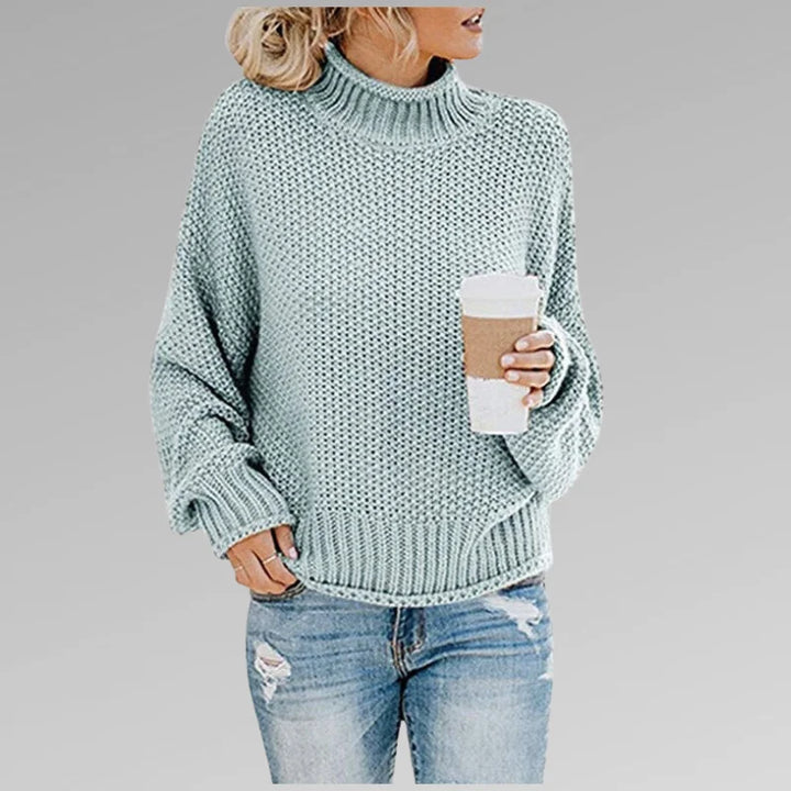 Babyblauer Damen Strickpullover mit Rollkragen, langen Ärmeln und weicher, angenehmer Materialqualität für gemütliche Tage.