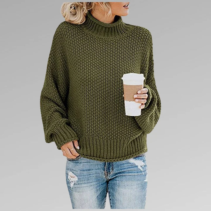 Damen Strickpullover in Grün mit Rollkragen, langen Ärmeln und weichem, warmem Material für gemütliche Tage.