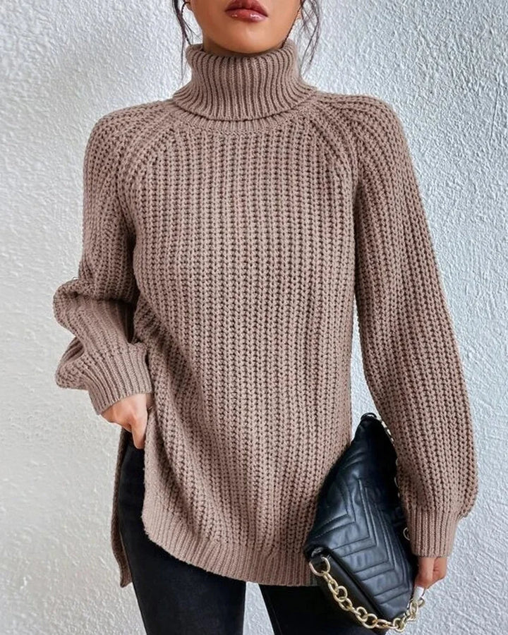 Khaki Damen Strickpullover mit Rollkragen, lockerem Schnitt und weicher, hochwertiger Baumwollmischung.