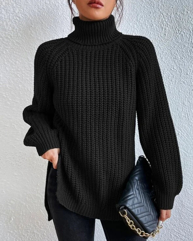 Schwarzer Damen Strickpullover mit Rollkragen, lockerem Schnitt und weicher, atmungsaktiver Baumwollmischung.