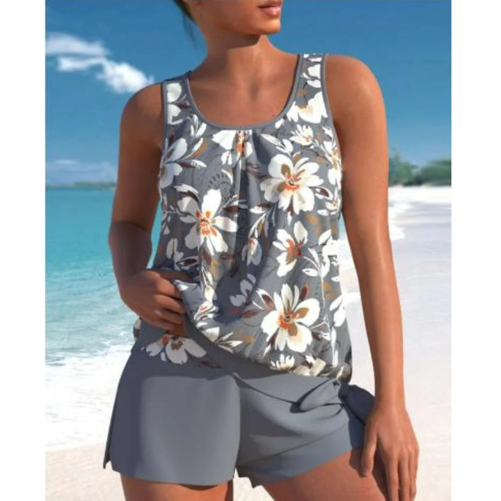 Damen Tankini Set in Grau mit Blumenmuster und Shorts, ideal für den Strand.
