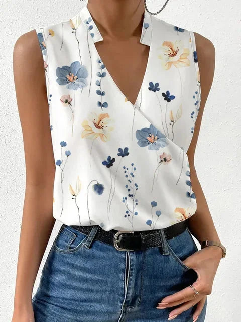 Damen Top mit V-Ausschnitt in Wickeloptik mit Blumenmuster, leichter Stoff, ideal für den Sommer, femininer Look.