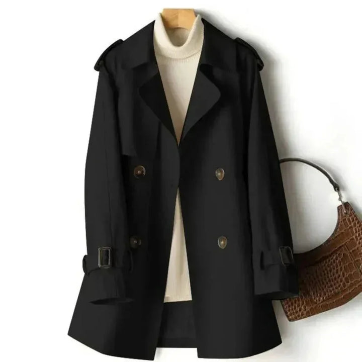 Damen Schwarz Doppelreihiger Trenchcoat mit Gürtel und Schulterklappen aus leichtem, strapazierfähigem Material.