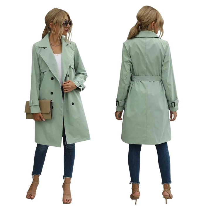 Grüner, knielanger Damen Trenchcoat aus weichem Material mit praktischem Gürtel und klassischem Reverskragen.