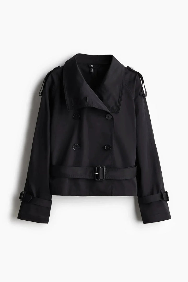 Damen Trenchcoat aus strapazierfähigem Stoff, mit hohem Kragen und Taillengürtel für eine figurbetonte Passform.