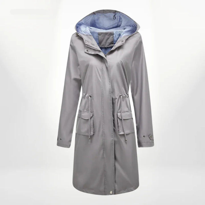 Grau Damen Trenchcoat mit Kapuze, wasserdichtem Stoff und tailliertem Schnitt für einen modernen Stil.