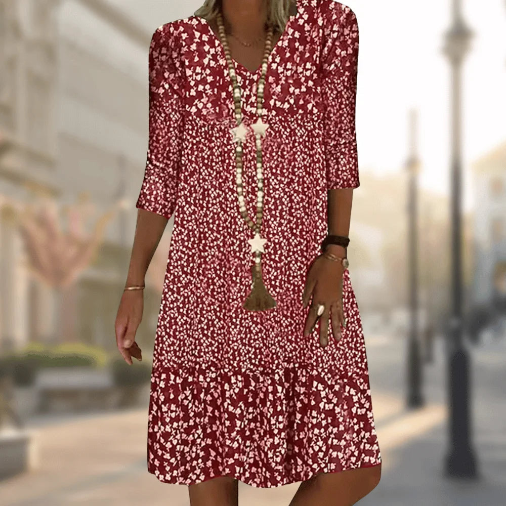 Rotes Damen Tunika-Kleid aus leichtem Stoff mit V-Ausschnitt und floralem Muster, ideal für den Sommer.