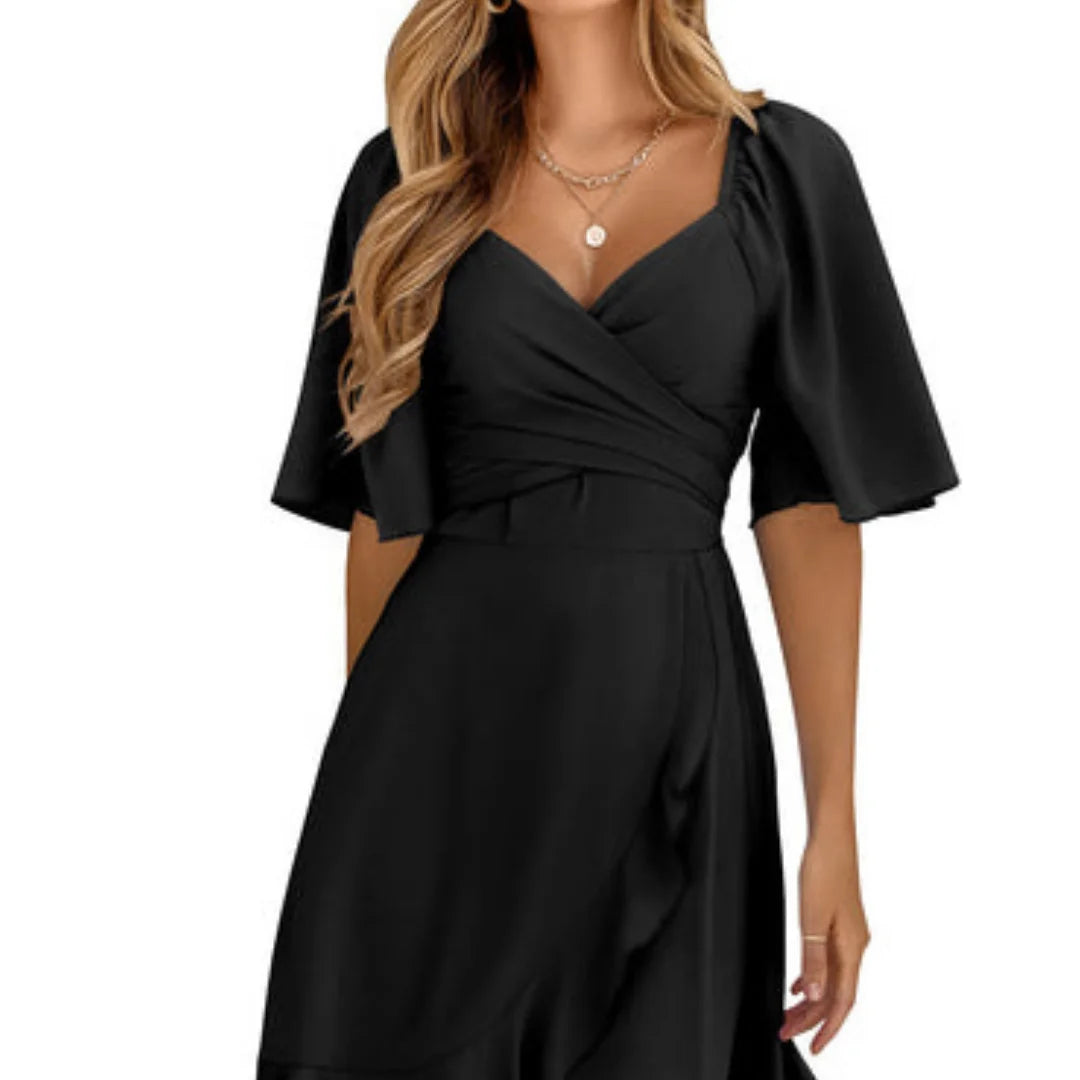 Schwarzes Damen V-Ausschnitt Kleid aus leichtem Stoff mit Rüschensaum und Wickeldetail für elegantes Abendoutfit.